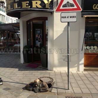 Man At Work In Bratislava With Bratislavaman